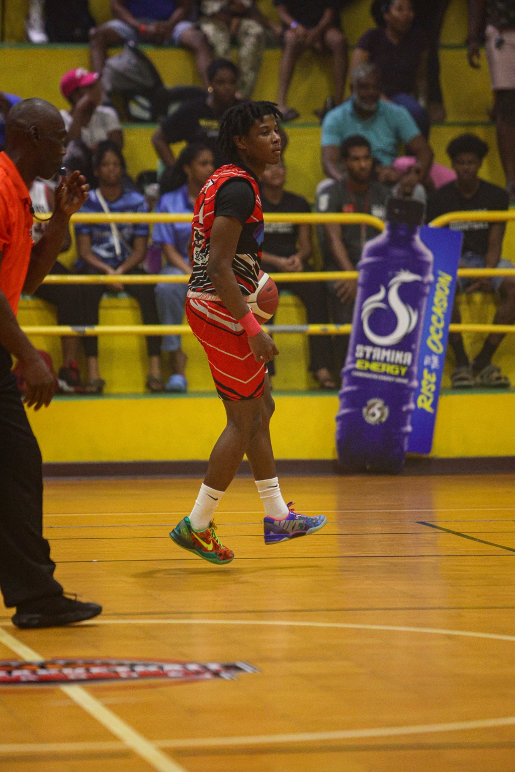Spartans TT player holding the ball during league action