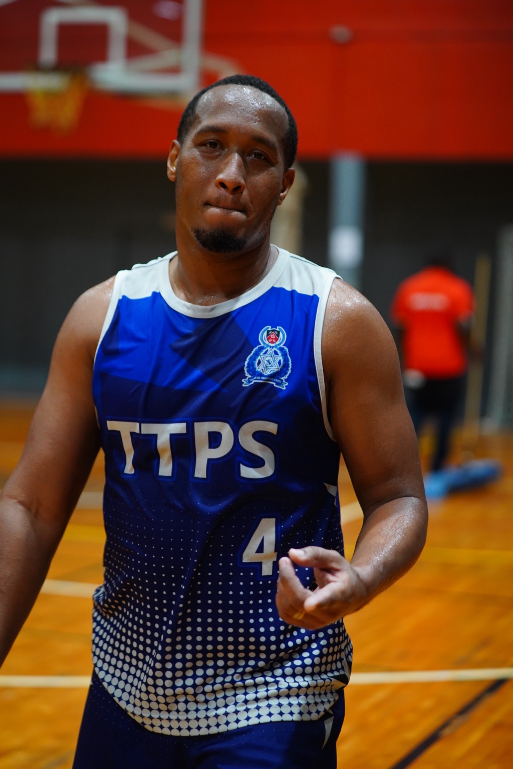 Sadiki Guerra wearing the blue TTPS number 4 jersey